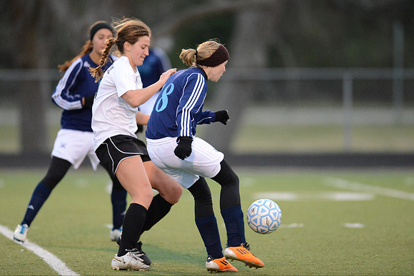Soccer 2013 Ð Brazoswood Lady Bucs varsity team defeats the Brazoswood Alumni team 2-1.