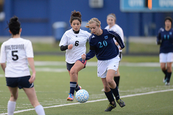 Soccer 2013 Ð Brazoswood Lady Bucs varsity team defeats the Brazoswood Alumni team 2-1.