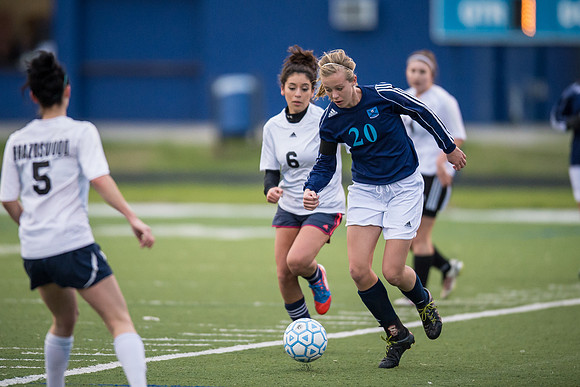 Soccer 2013 – Brazoswood Lady Bucs varsity team defeats the Brazoswood Alumni team 2-1.