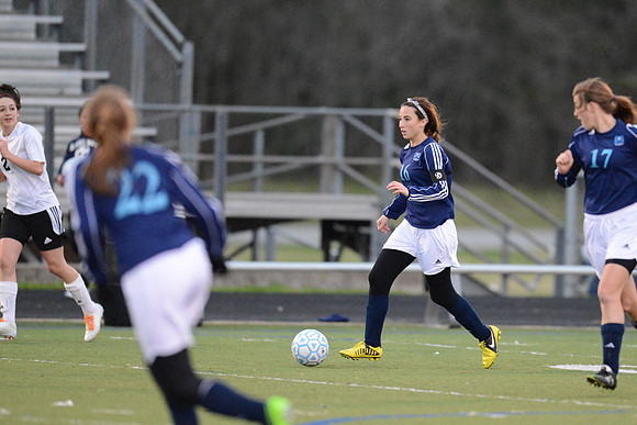 Soccer 2013 Ð Brazoswood Lady Bucs varsity team defeats the Brazoswood Alumni team 2-1.