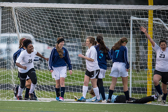 Soccer 2013 – Brazoswood Lady Bucs varsity team defeats the Brazoswood Alumni team 2-1.