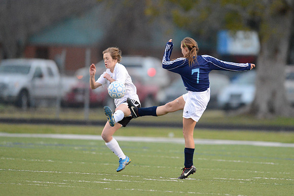 Soccer 2013 Ð Brazoswood Lady Bucs varsity team defeats the Brazoswood Alumni team 2-1.